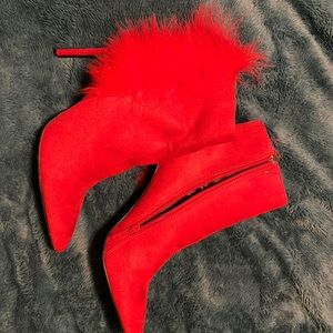 Red high heel booties with faux fur